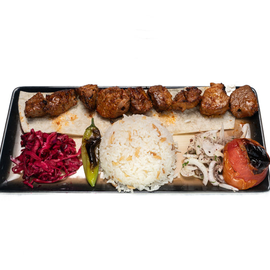 Grilled Lamb Shish Kebab skewers served with rice and fresh salad at Zuzu Kebab Singapore